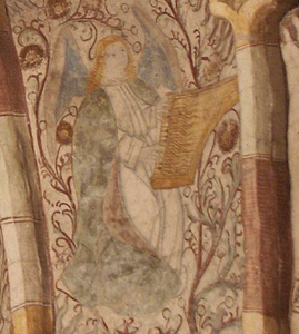 Engel spiller på clavesimbalum. Bemærk de lange tangenter – måske er der tale om et vingeformet klavichord. Kalkmaleri i hvælvkappe malet af Albertus Pictor, 15. årh. Jumkil kyrka, Uppland.